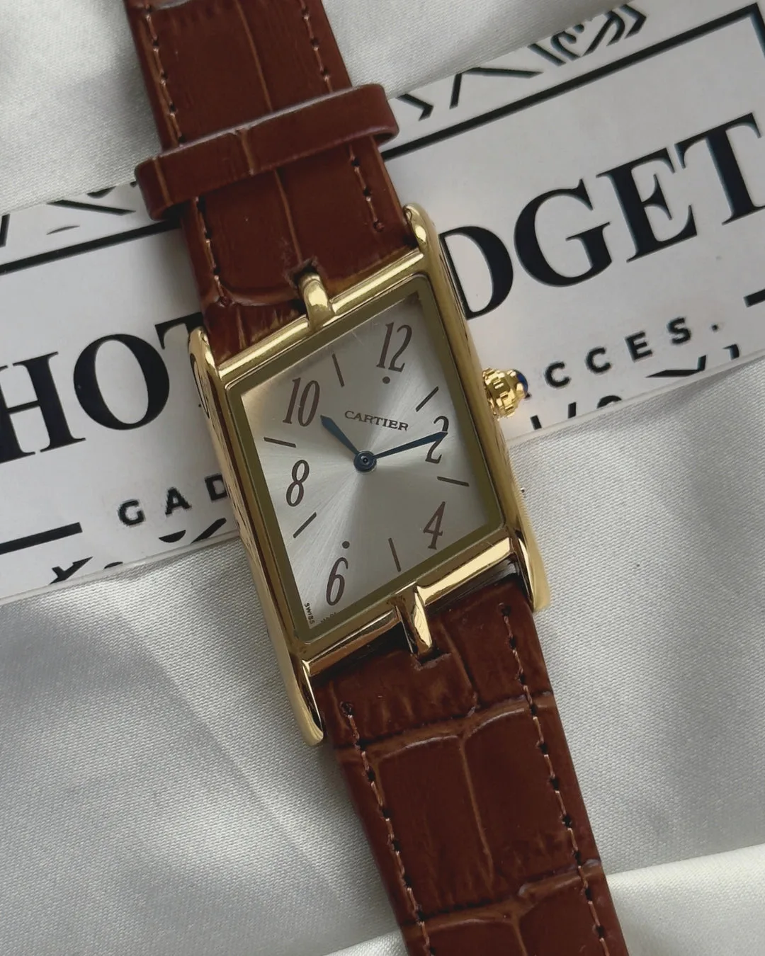 Cartier-Tank Asymétrique (Analog Watch) Cartier-Tank Asymétrique (Analog Watch) – Silver Dial / Brown Strap