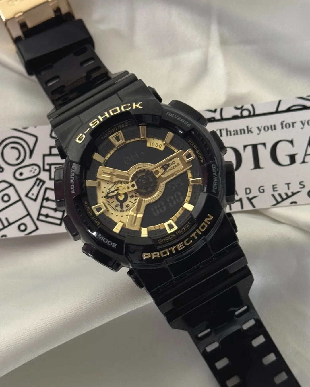 GShock-GA-11011B (Analog Digital Watch) GShock-GA-11011B (Analog Digital Watch) – Gold Dial / Black Strap