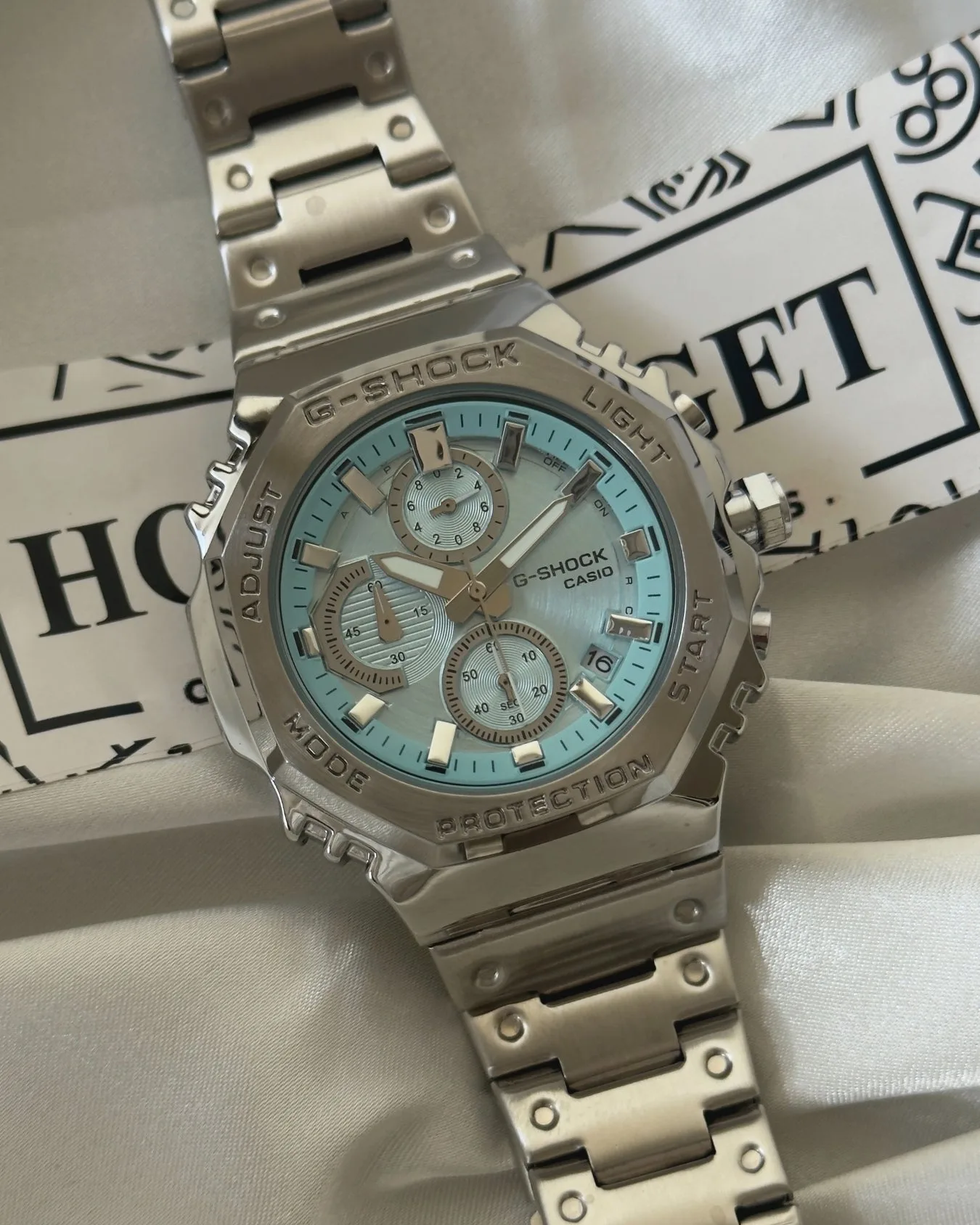 GShock-GMCB2100 (Analog Digital Watch) GShock-GMCB2100 (Analog Digital Watch) – Mint Blue Dial / Silver Strap