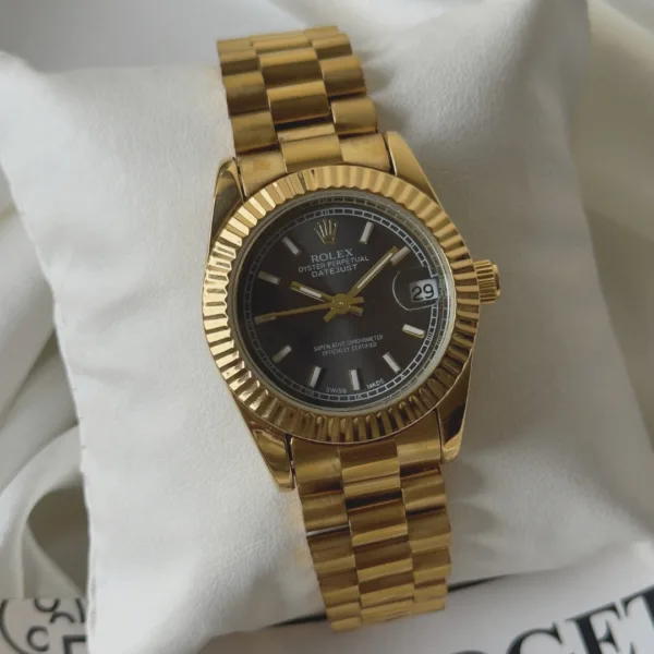 RLX Day-Date 40 – Oyster – Black Dial / Gold Strap
