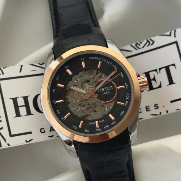 TissotCouturier 1853 (Automatic Watch) – Black Dial / Black Strap – Rose Gold Case