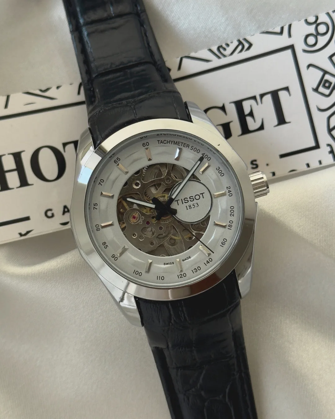 TissotCouturier 1853 (Automatic Watch) TissotCouturier 1853 (Automatic Watch) – White Dial / Black Strap