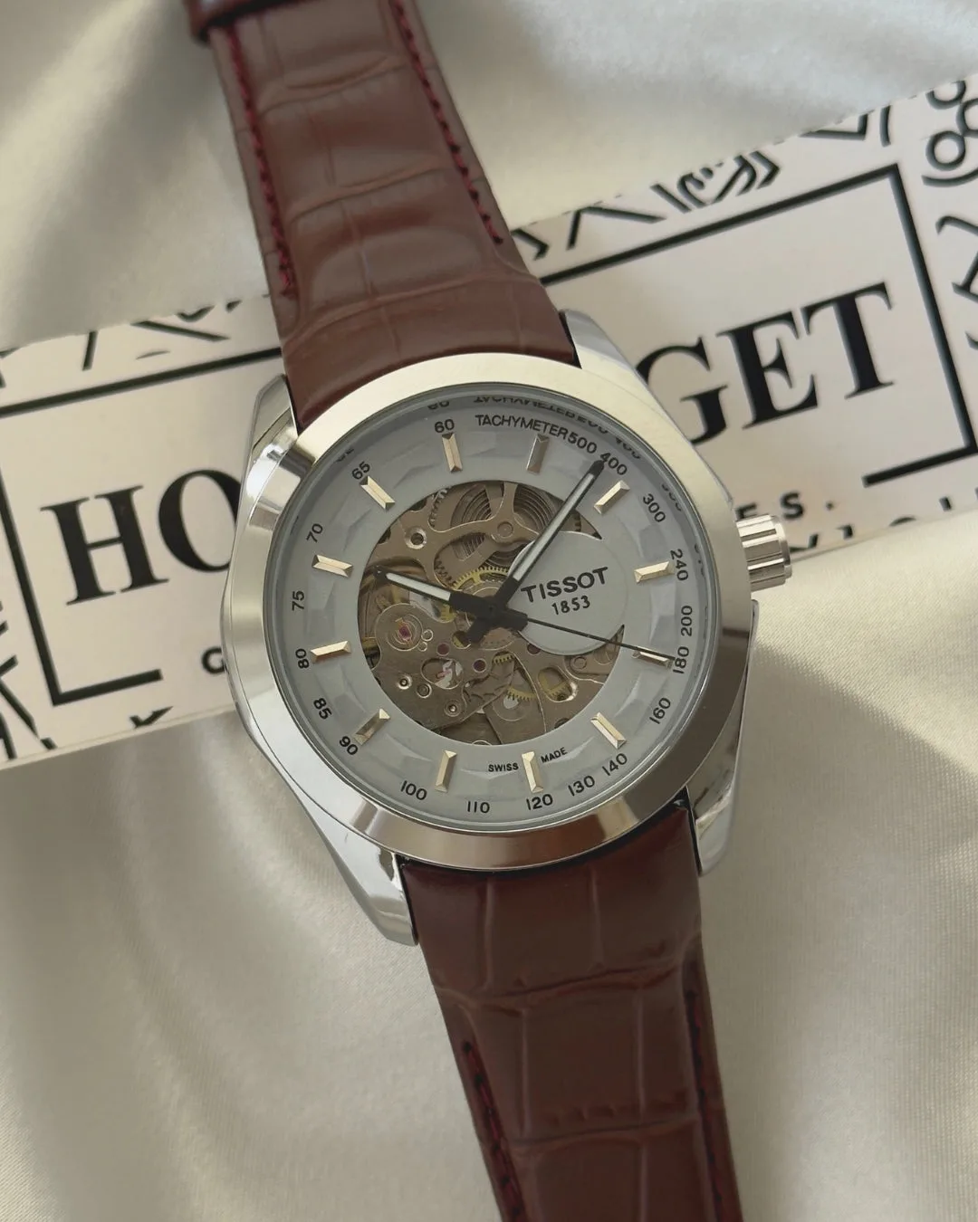 TissotCouturier 1853 (Automatic Watch) TissotCouturier 1853 (Automatic Watch) – White Dial / Brown Strap