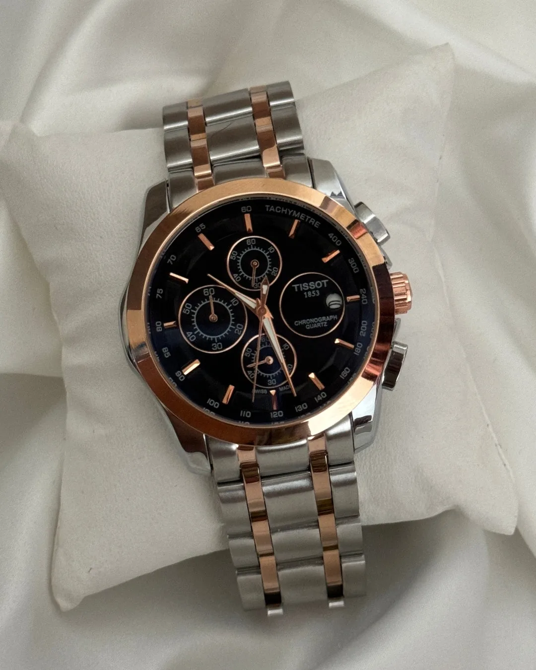 TST Couturier 1853 (Chronograph Watch) TST Couturier 1853 (Chronograph Watch) – Black Dial / Silver & Rose Strap