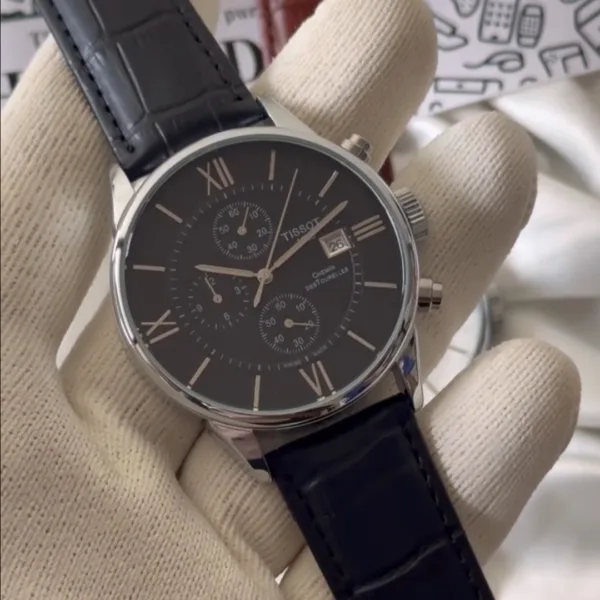 TissotCouturier 1853 (Chronograph Watch) – Black Dial / Black Strap – Roman Numerals